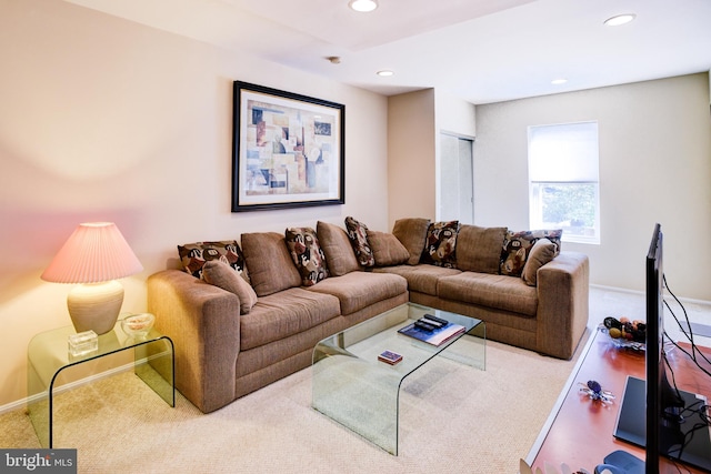 living room featuring light colored carpet