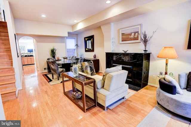 living room with light hardwood / wood-style floors