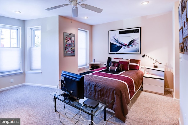 carpeted bedroom with ceiling fan