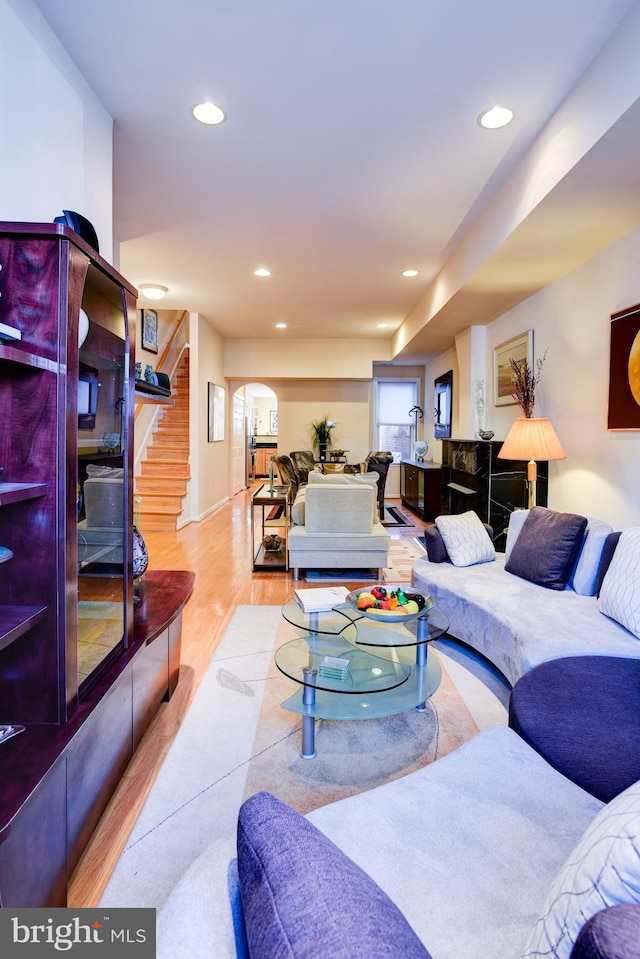 living room with light hardwood / wood-style floors