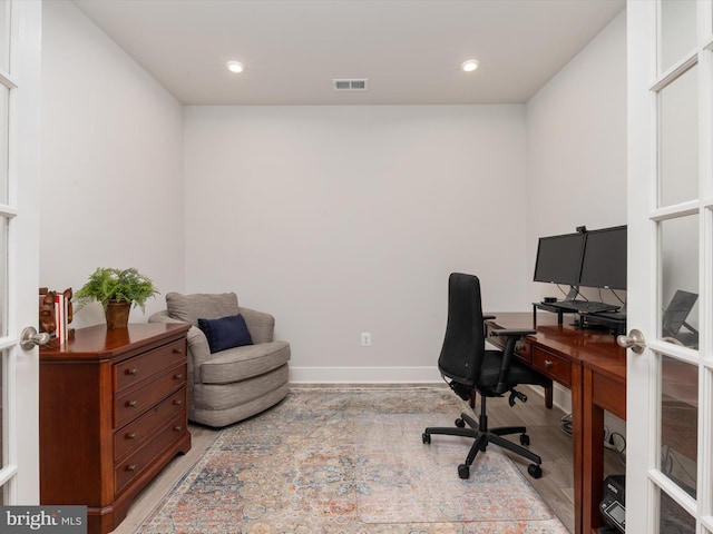 office space featuring light hardwood / wood-style floors