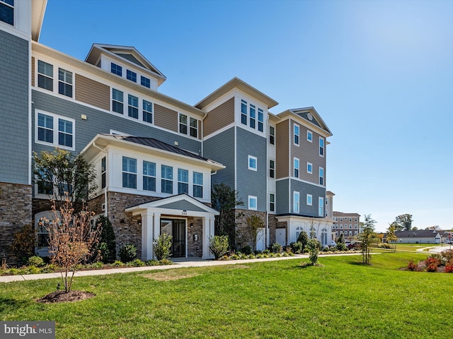 exterior space with a front lawn