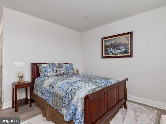 bedroom featuring light wood-type flooring