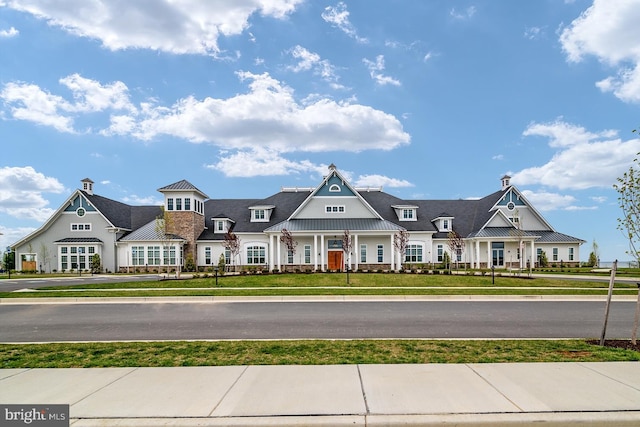 view of front of home with a front lawn