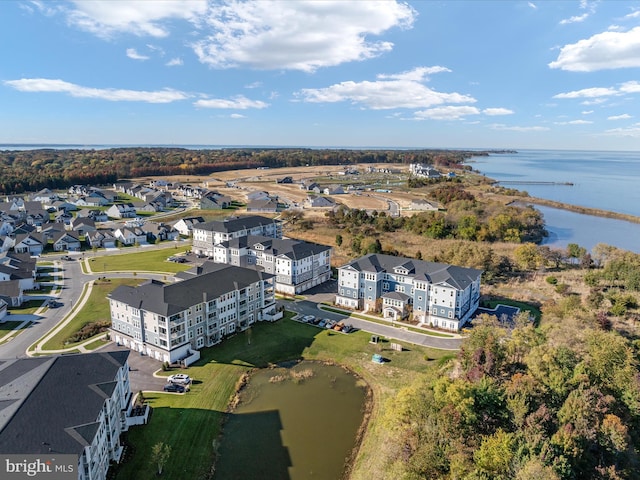 drone / aerial view with a water view