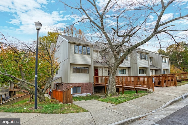 view of front of property with a deck