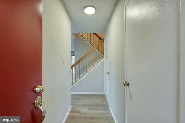 corridor featuring light wood-type flooring