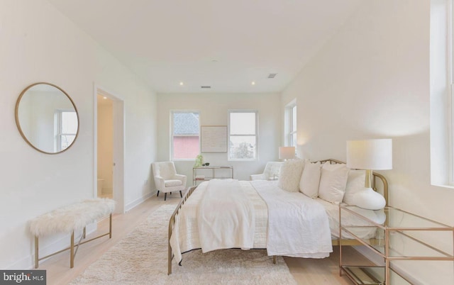 bedroom featuring light hardwood / wood-style flooring