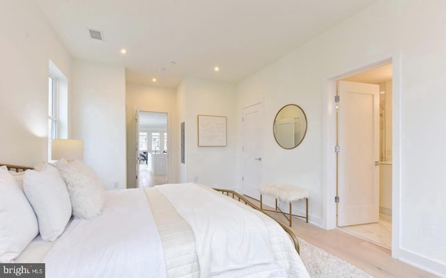 bedroom featuring light hardwood / wood-style flooring