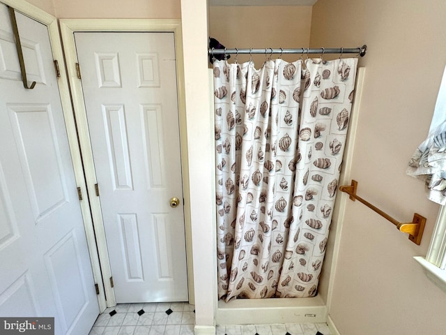 bathroom with walk in shower