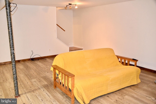 bedroom with hardwood / wood-style floors