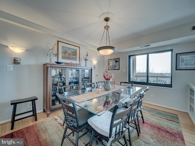 dining area featuring light hardwood / wood-style flooring