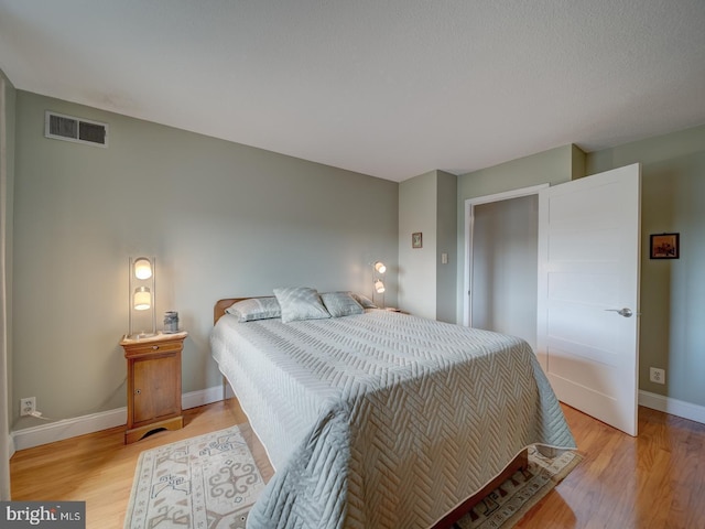 bedroom featuring light hardwood / wood-style flooring