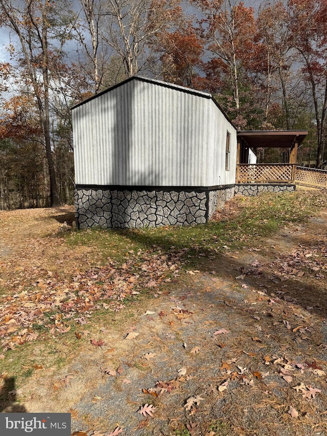 view of outdoor structure with a carport