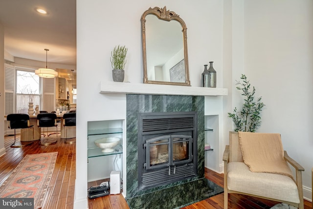 sitting room featuring hardwood / wood-style flooring