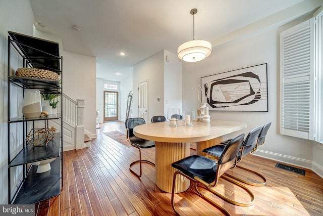 dining room featuring hardwood / wood-style flooring