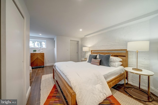 bedroom featuring dark hardwood / wood-style floors