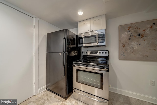 kitchen with white cabinets and stainless steel appliances