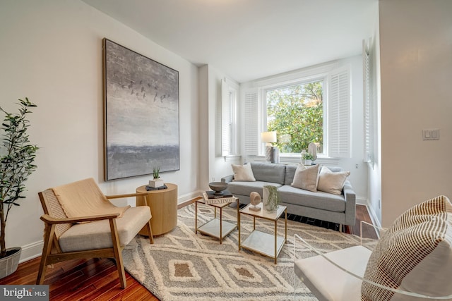 sitting room with hardwood / wood-style floors