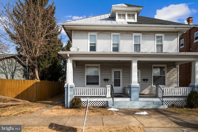 view of front of home featuring covered porch