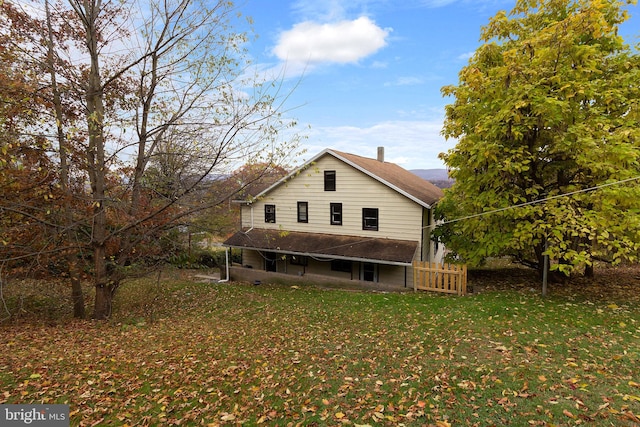 exterior space featuring a yard