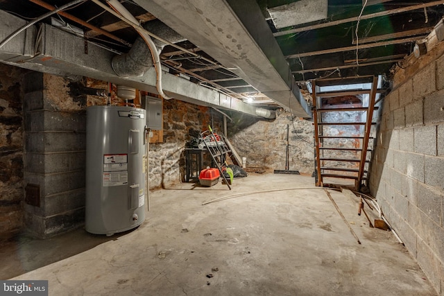 basement with electric panel and water heater