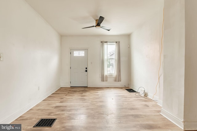 entrance foyer with ceiling fan and light wood-type flooring