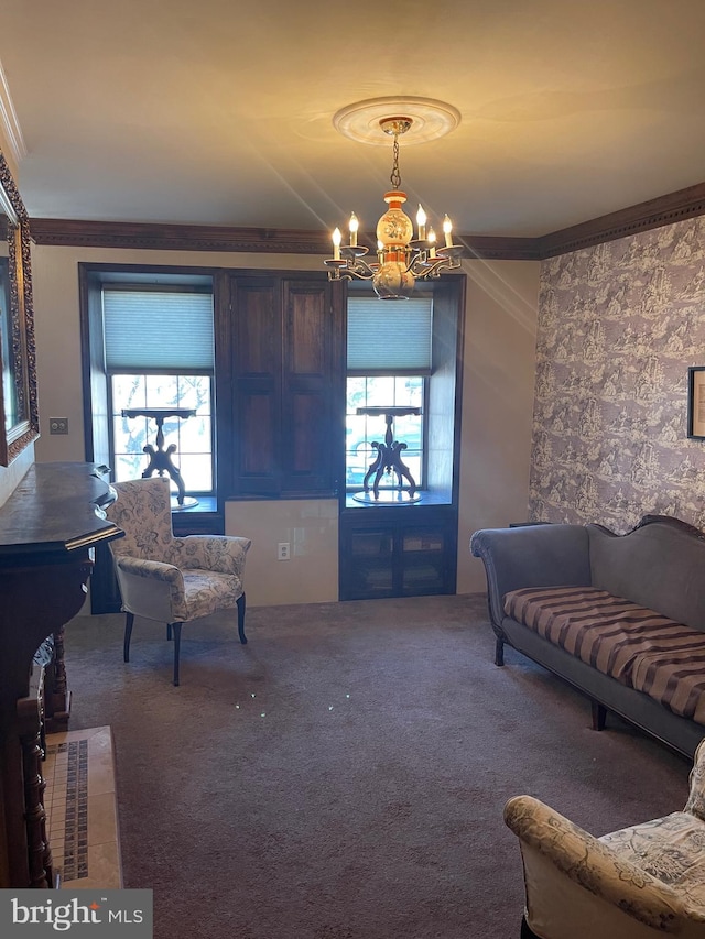 carpeted living room with an inviting chandelier, plenty of natural light, and ornamental molding