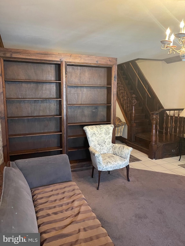 living area with carpet flooring and an inviting chandelier