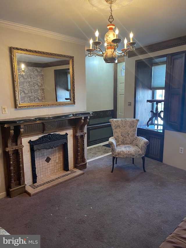 living area featuring carpet, a fireplace, and crown molding