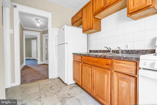 kitchen featuring light colored carpet, decorative backsplash, sink, crown molding, and white appliances