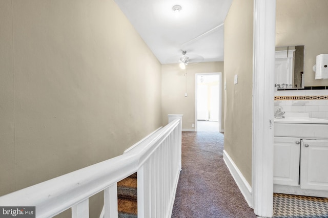 hallway with carpet