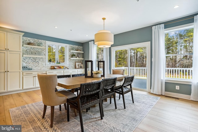 dining room featuring light wood-type flooring