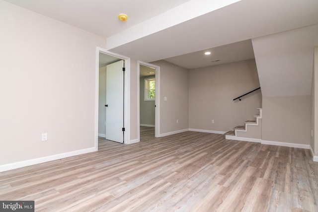 spare room featuring light wood-type flooring