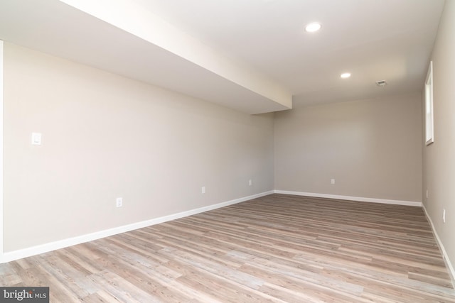 unfurnished room featuring light wood-type flooring