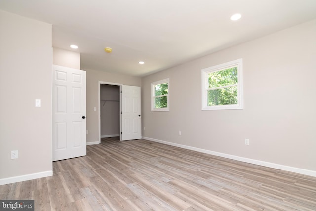 unfurnished bedroom with light hardwood / wood-style flooring