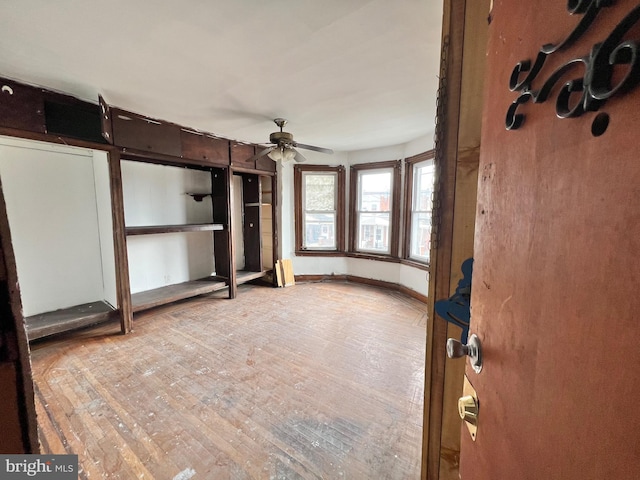 interior space featuring light hardwood / wood-style flooring and ceiling fan