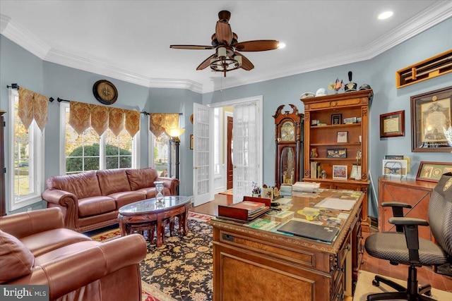 home office featuring light hardwood / wood-style floors, ceiling fan, and crown molding