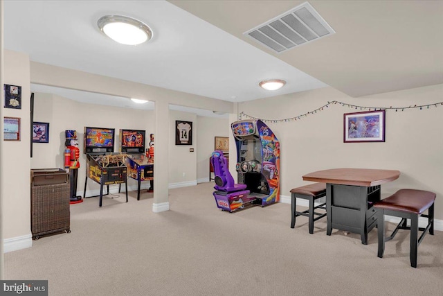 rec room with light carpet