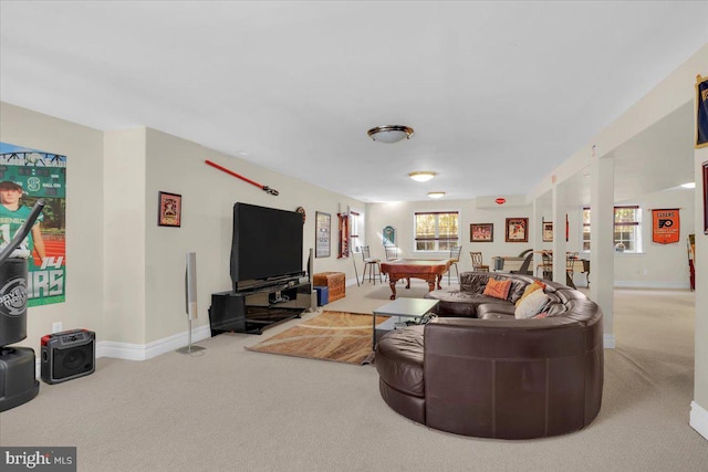 carpeted living room with pool table