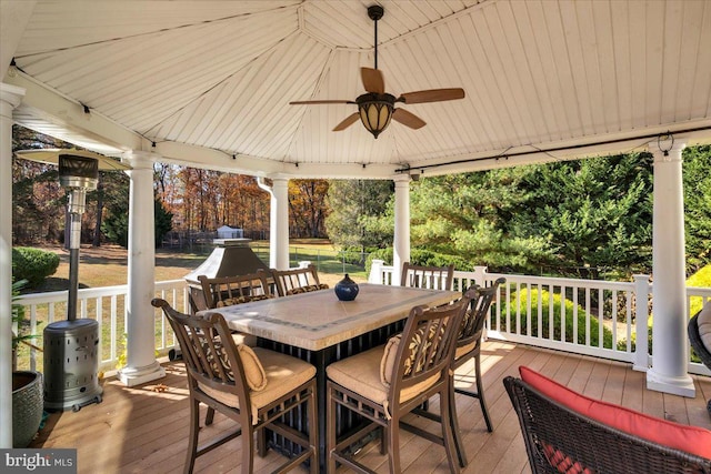 wooden deck with ceiling fan