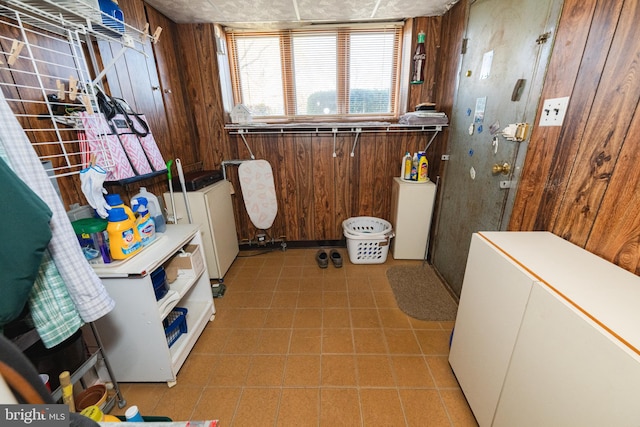 washroom with wood walls