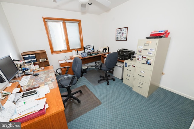 carpeted home office with ceiling fan