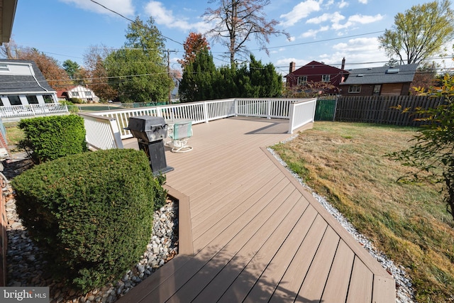 wooden deck with a yard