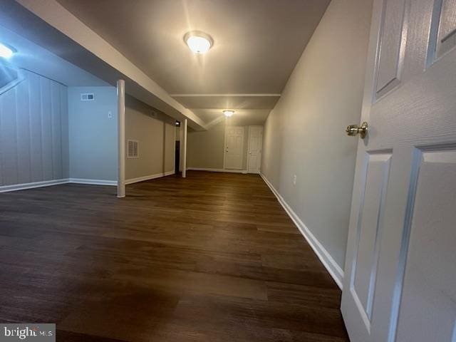 bonus room featuring dark hardwood / wood-style flooring