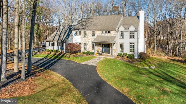 view of front of house with a front yard