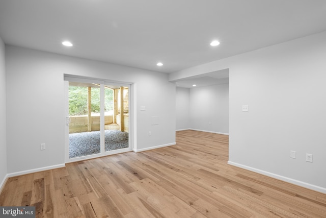 unfurnished room featuring light wood-type flooring