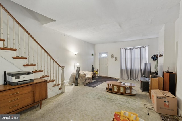 living room with light colored carpet