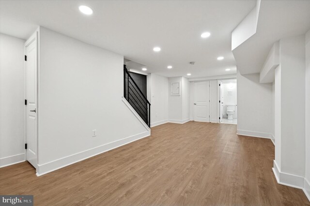 basement featuring hardwood / wood-style flooring