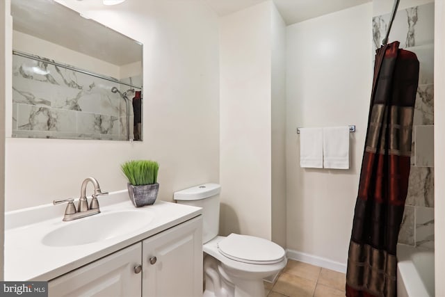 full bathroom featuring toilet, vanity, tile patterned floors, and shower / bath combo with shower curtain